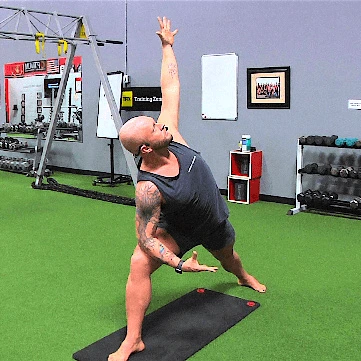 Instructor teaching a yoga class