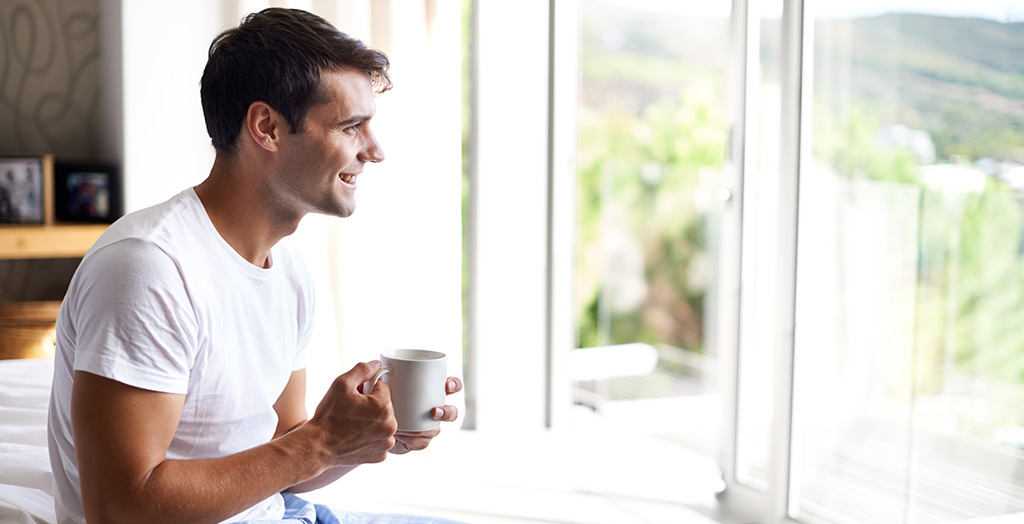 young man drinking coffee