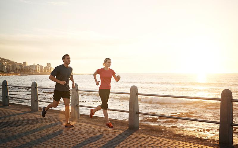 runners at beach