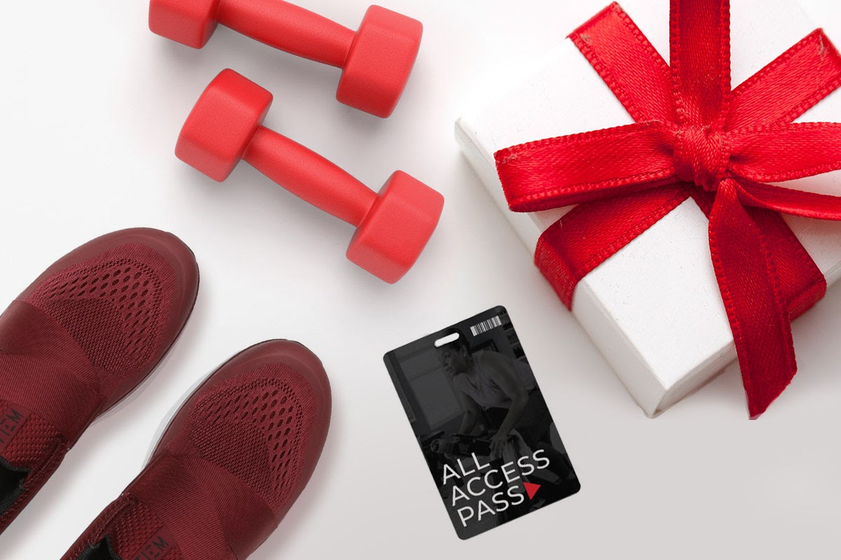 Picture of fitness gifts for Valentine’s Day, including red weights, shoes and a fitness pass.