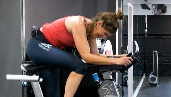 Image of person doing a hover during a Spin class workout