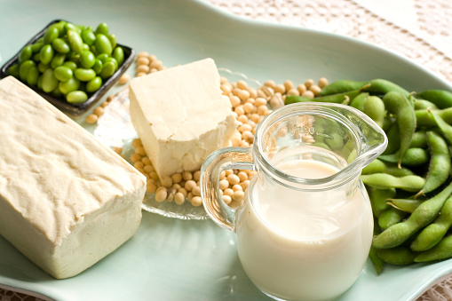 Plate of soybeans, edamame, tofu and soy milk