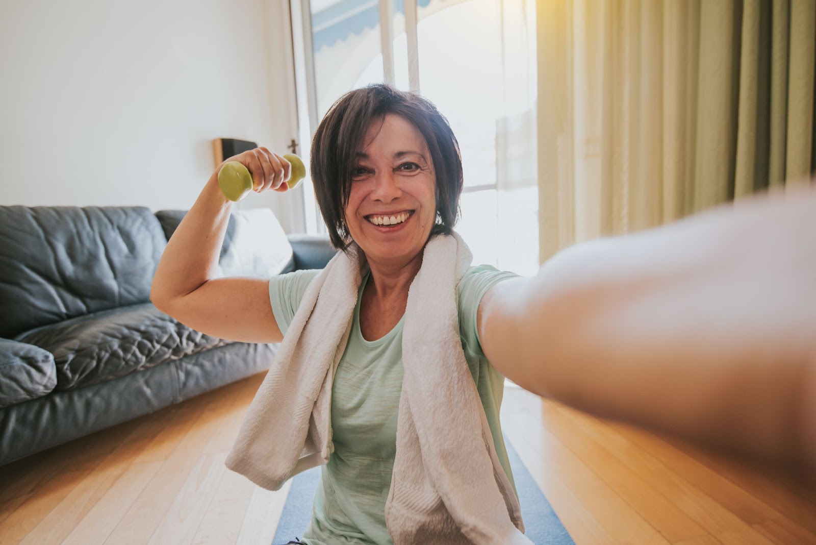 Woman taking a selfie for her workout progress
