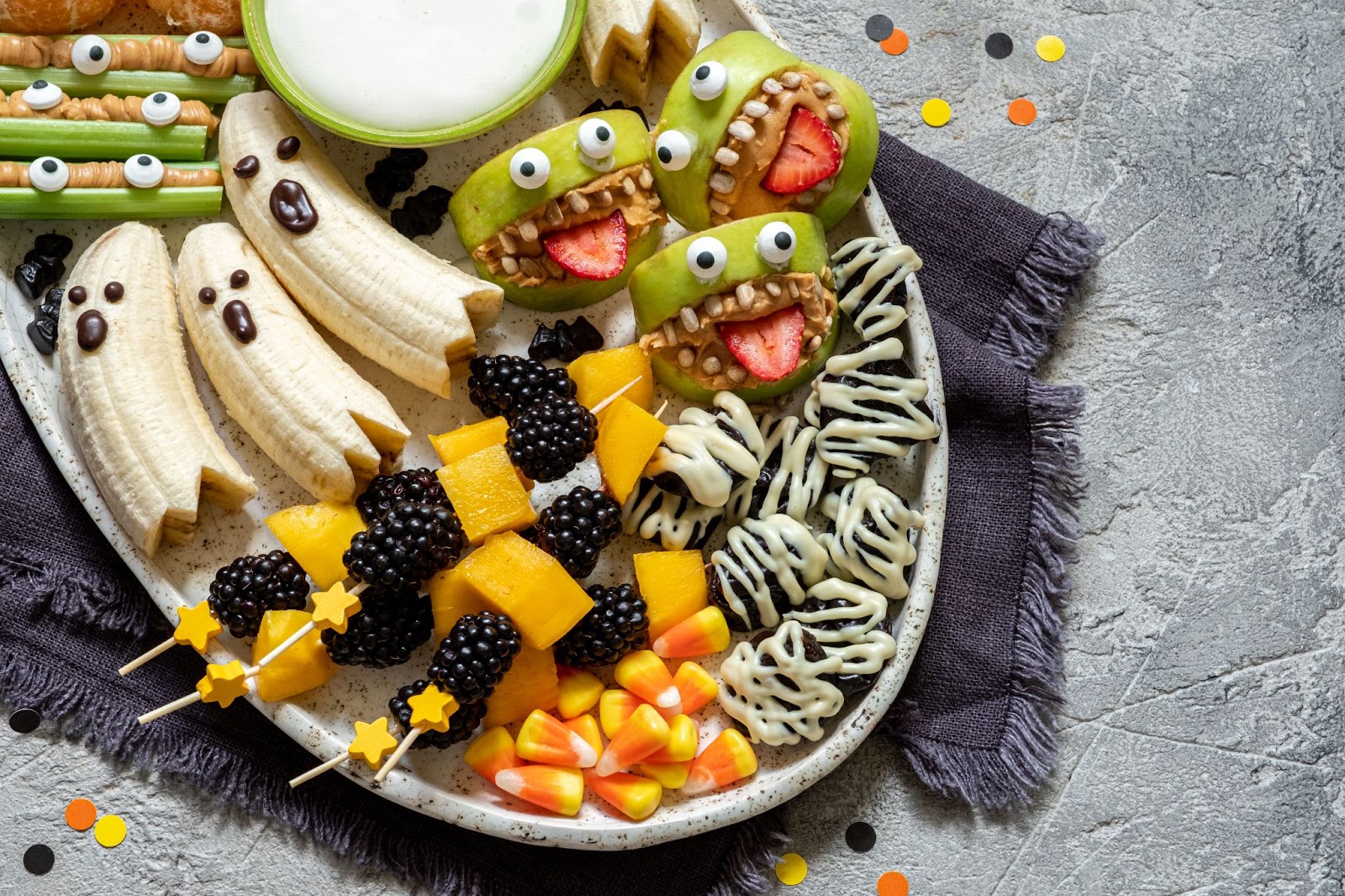 Halloween themed plate of fruits and veggies