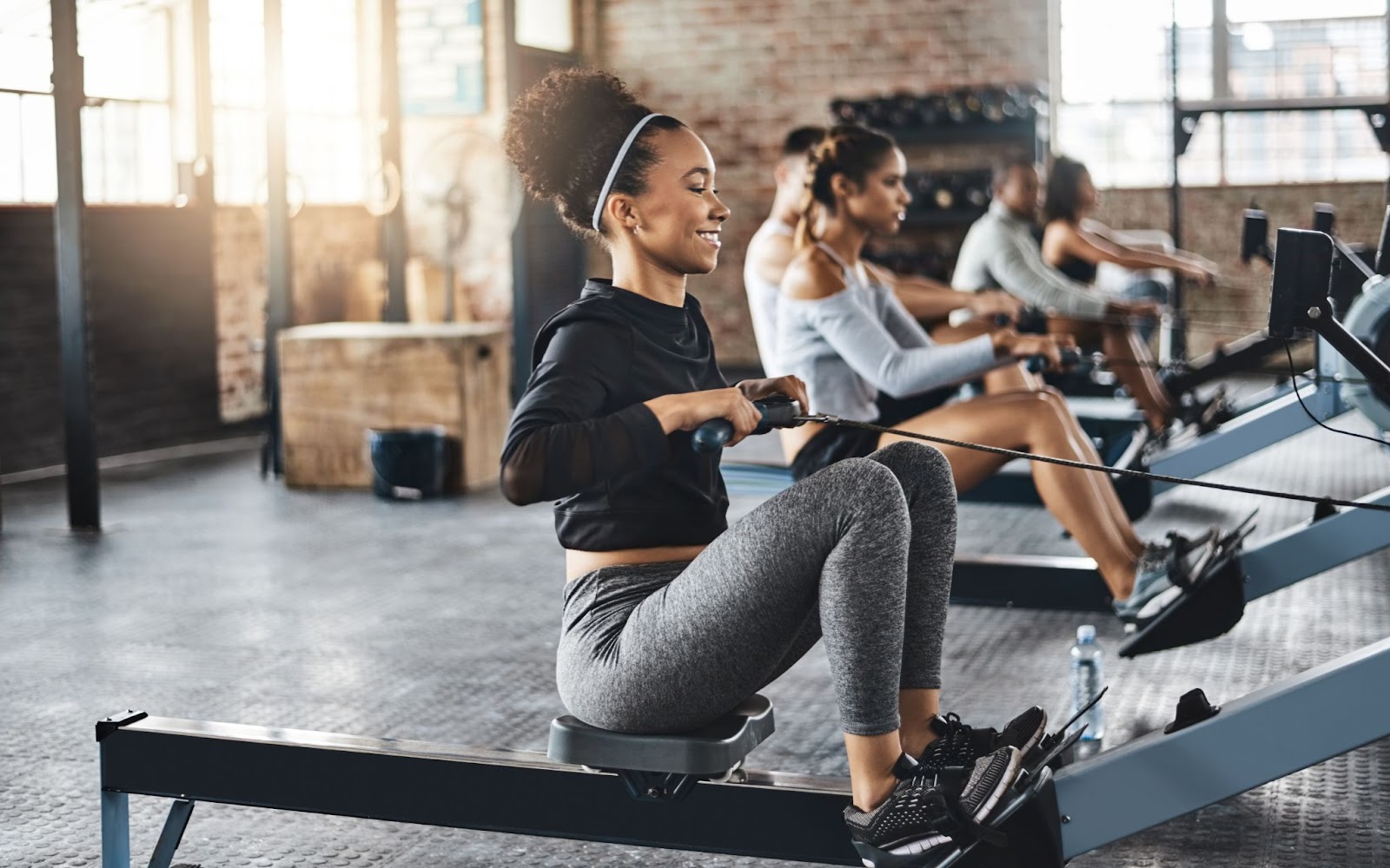 Woman working out on a rowing machine