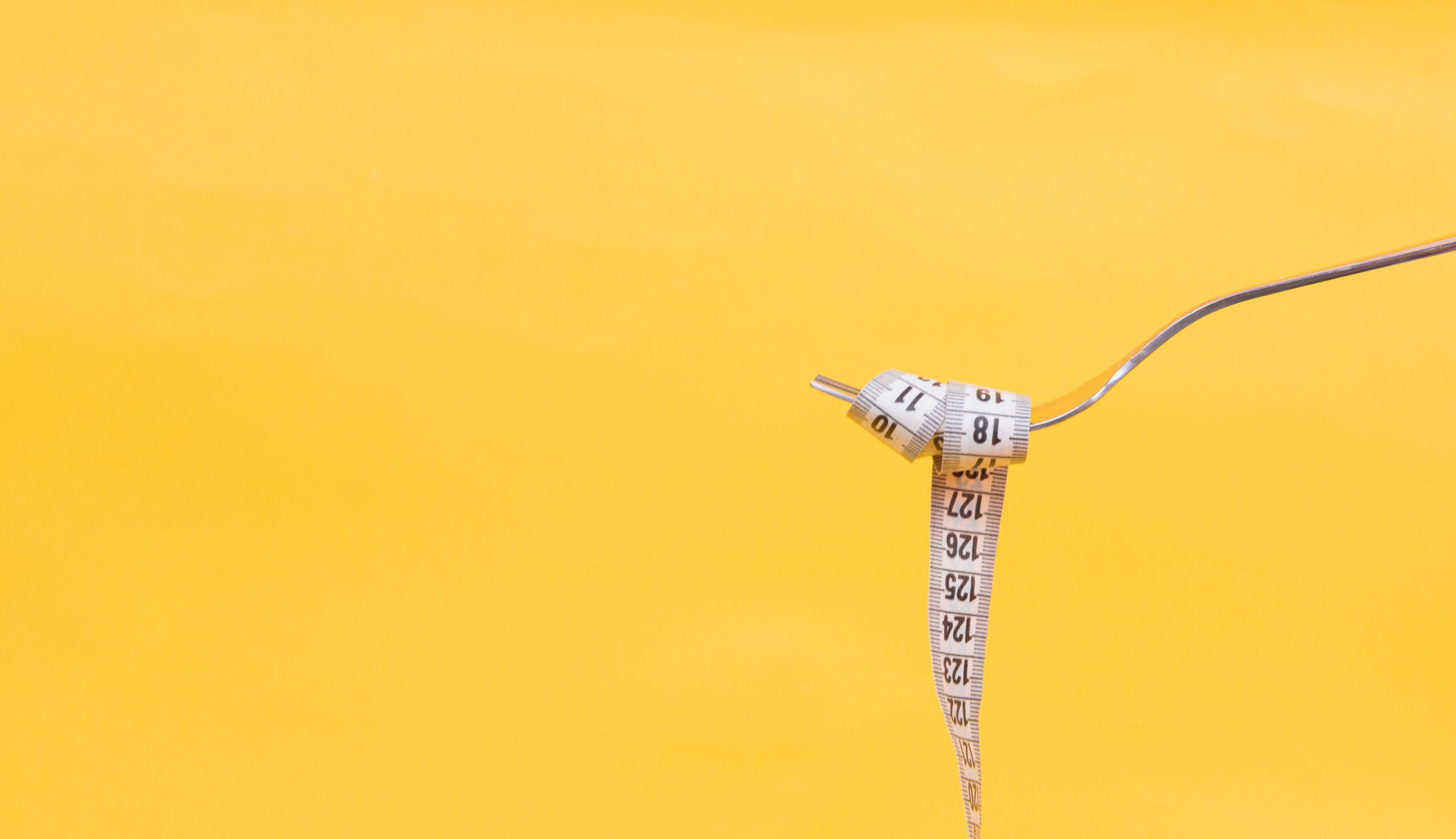 fork with tape measure