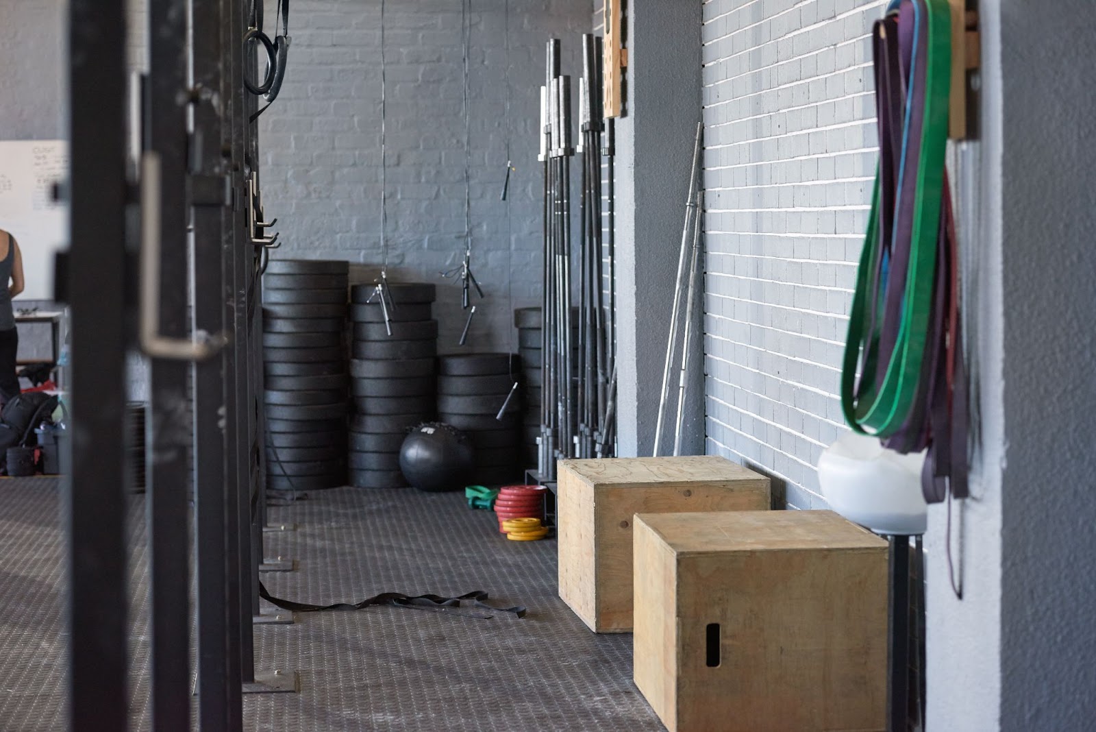 Crossfit-style gym with several pieces of fitness equipment inside