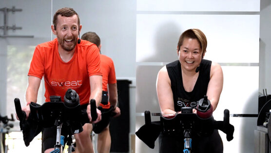two-instructor indoor cycle class Opposites Attract Cycle