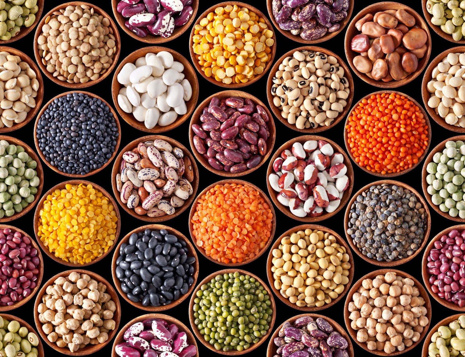 Overhead shot image of several different kinds of beans and lentils