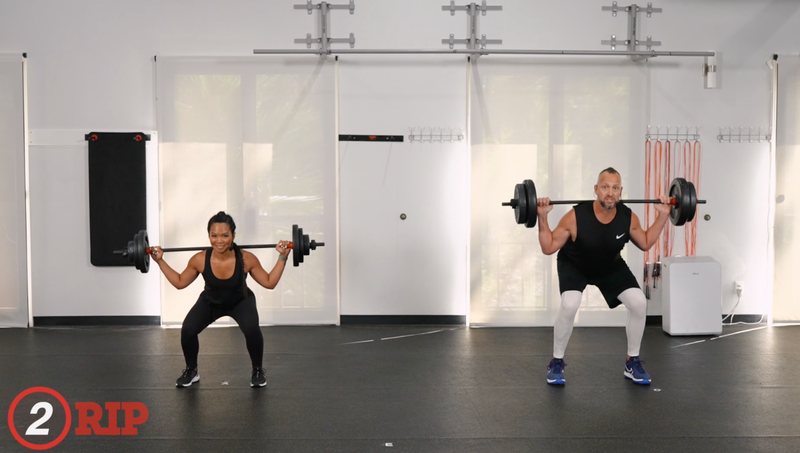 Still image from a RIP Barbell on demand fitness class