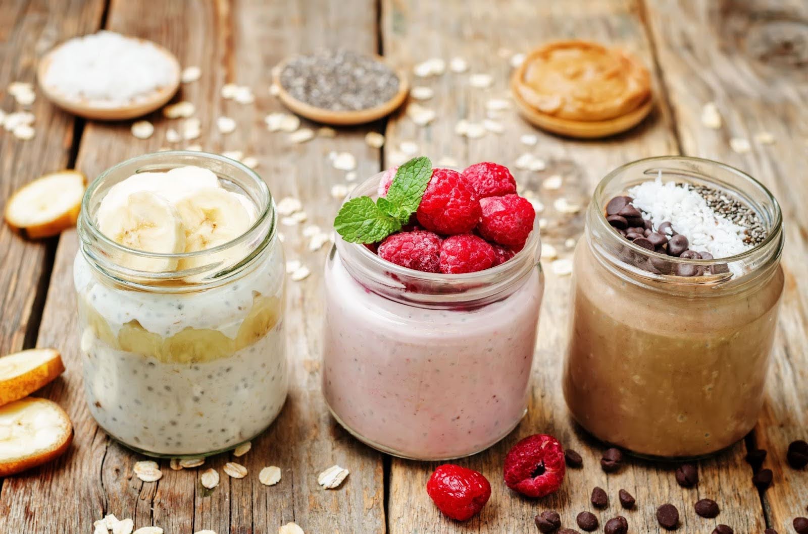 Image of three mason jars filled with overnight oats in them