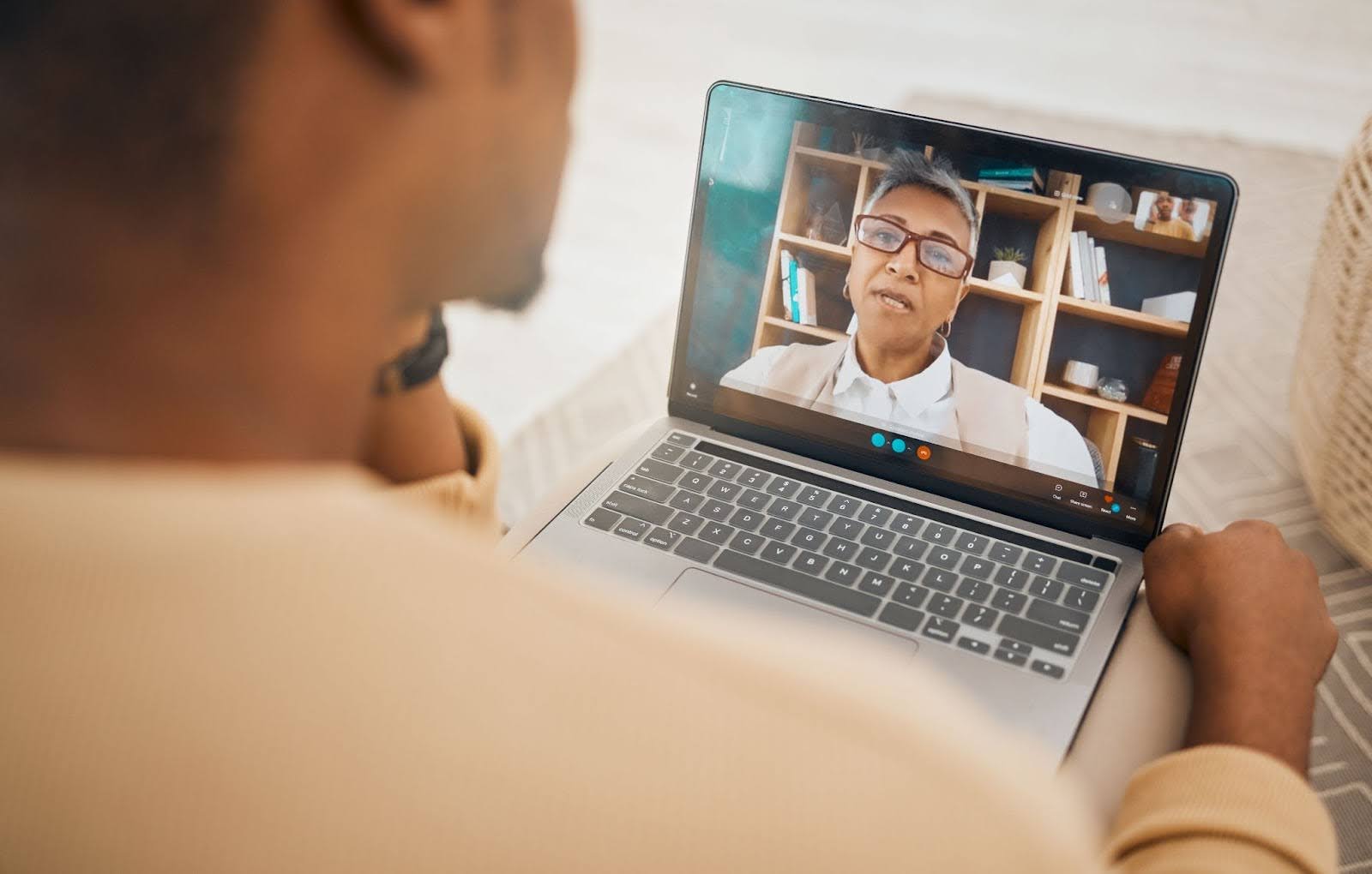 Closeup shot of two people in a virtual counseling session