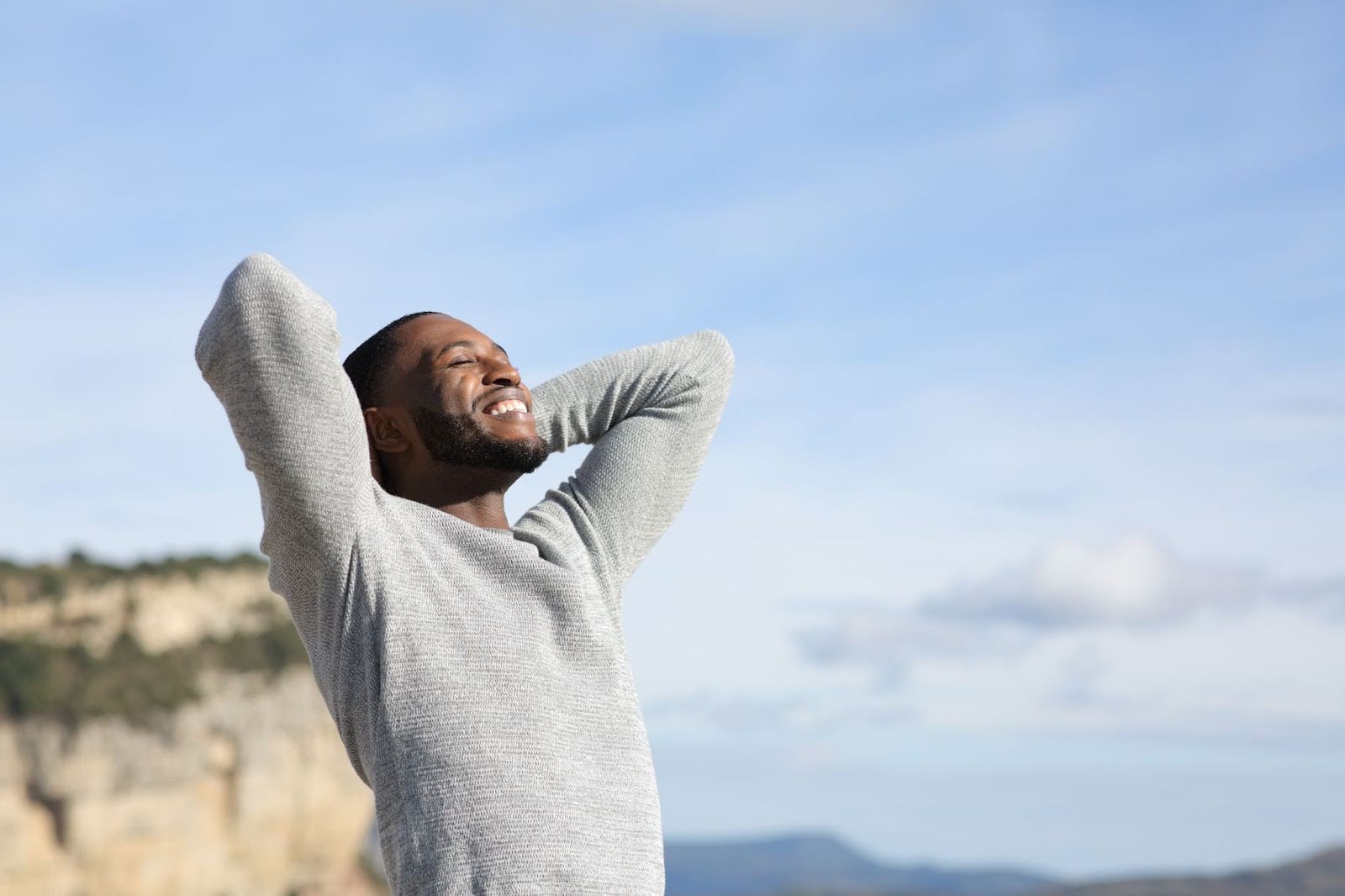 Healthy, happy man smiling outside